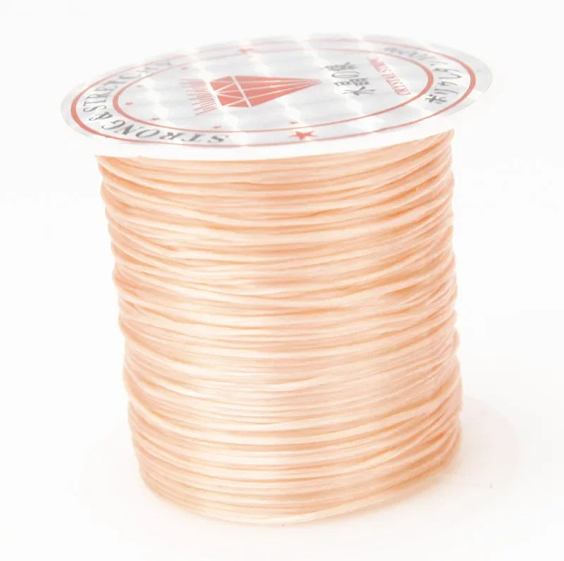 A spool of 10m multicolour elastic cord for beading and jewelry making