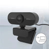 Eine schwarze HD-Webcam mit flexiblem Kabel neben einem Laptop.