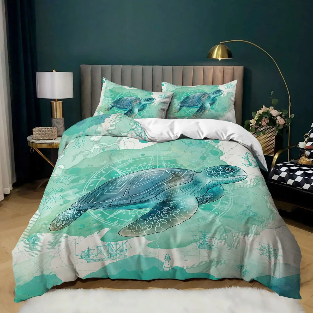 A teal and white sea turtle patterned duvet cover set displayed on a bed with a gray headboard.