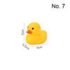 A bright yellow rubber duck toy used as a squeaky bath toy for babies.