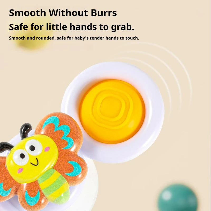 A set of three colorful spinning top fidget toys with watch bands, featuring bee and flower designs.