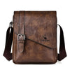 A brown vintage PU leather messenger bag for men with an adjustable strap.