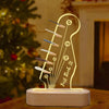 Illuminated acrylic guitar pick holder with a wooden base featuring a guitar outline and the text Just Rock It