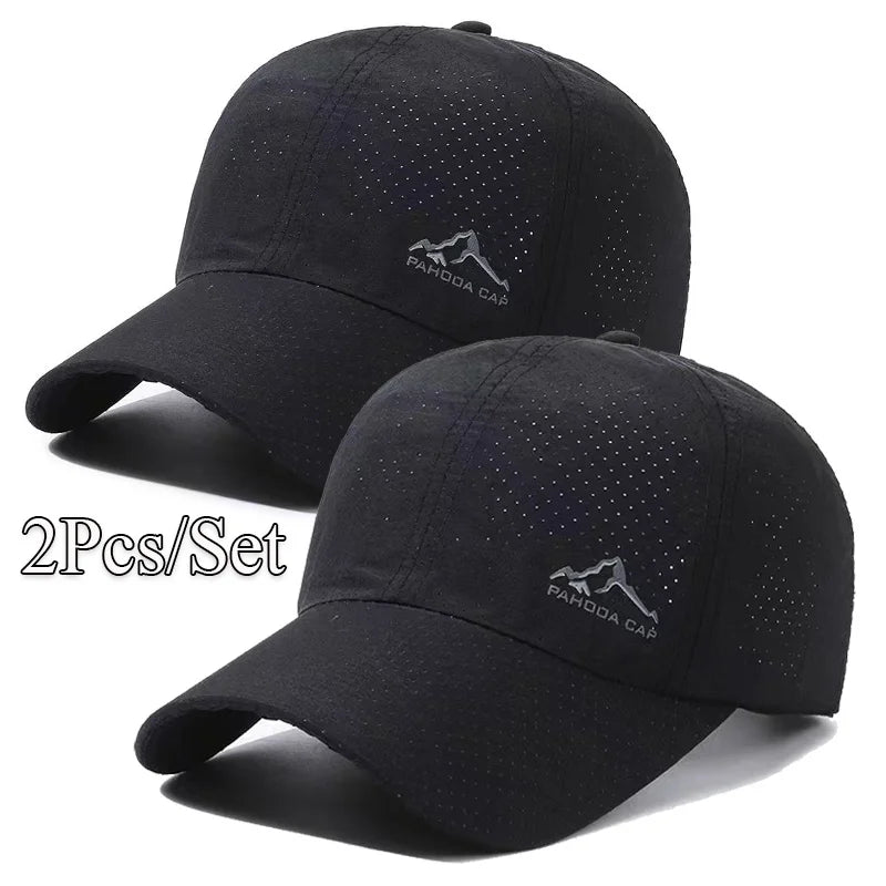 Black embroidered Pahoda cap set featuring a mountain design