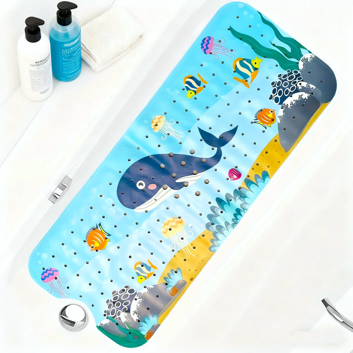 A bright blue bathtub mat featuring a cartoon whale and various sea creatures with suction cups.