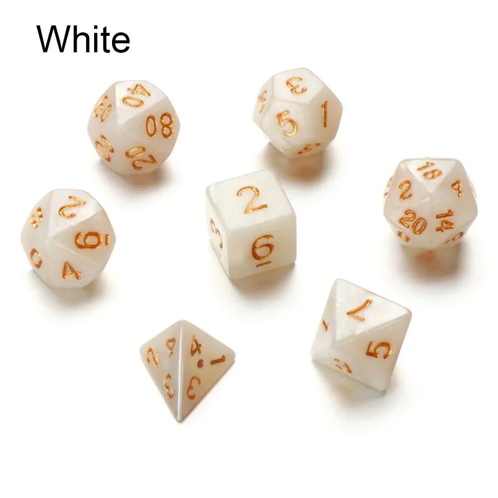 A set of white polyhedral dice including a d10, d6, and d20, displayed on a white background.