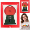 A red frame displaying a vintage rotating candy display with an open lid showing colorful candies.