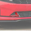 Close-up of a red front fascia trim kit for a Chevrolet Camaro vehicle.