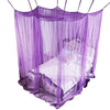 Purple mosquito net bed canopy with a white bed inside, suspended by strings.