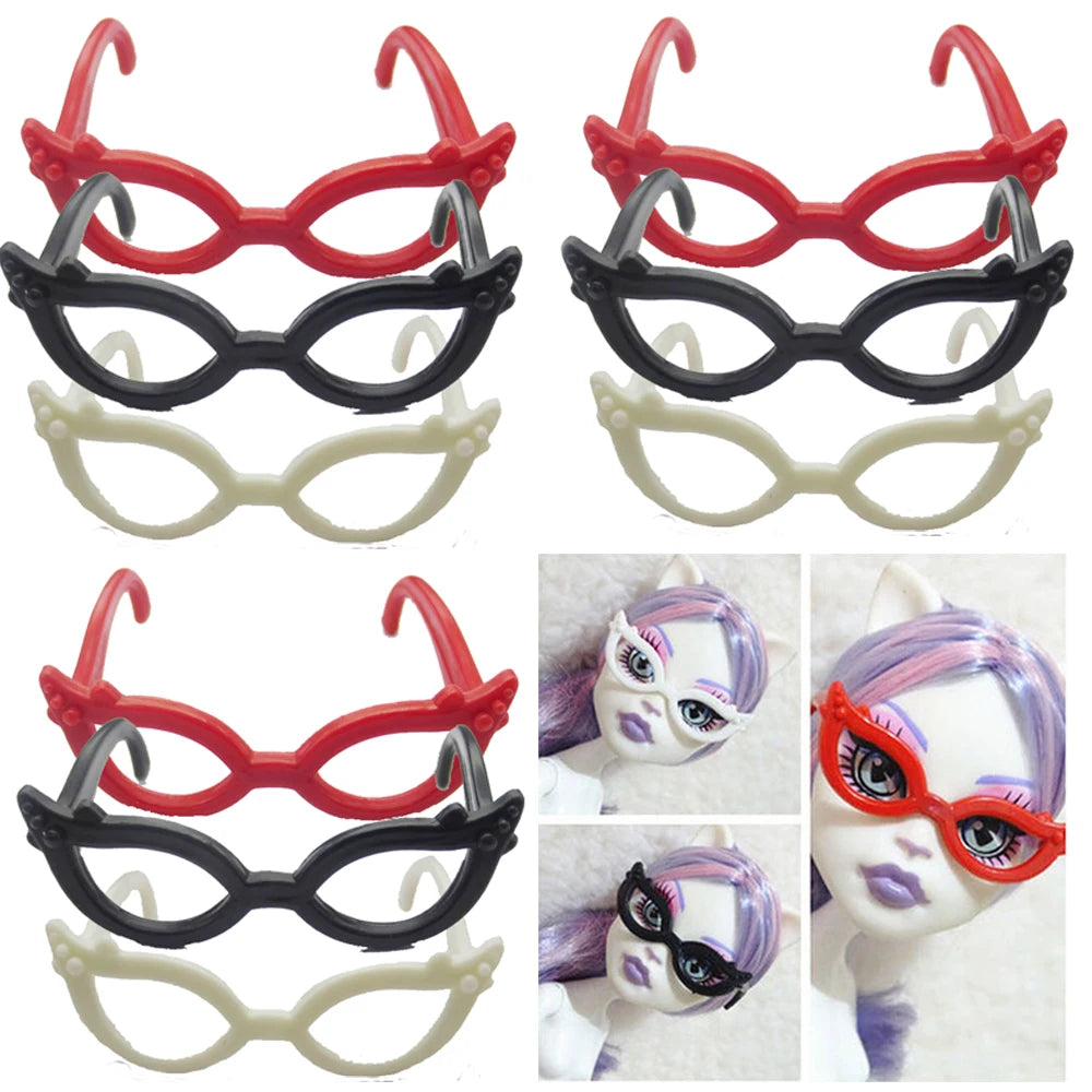 A collection of various fashion doll glasses and eyewear accessories in red, black, and white plastic.