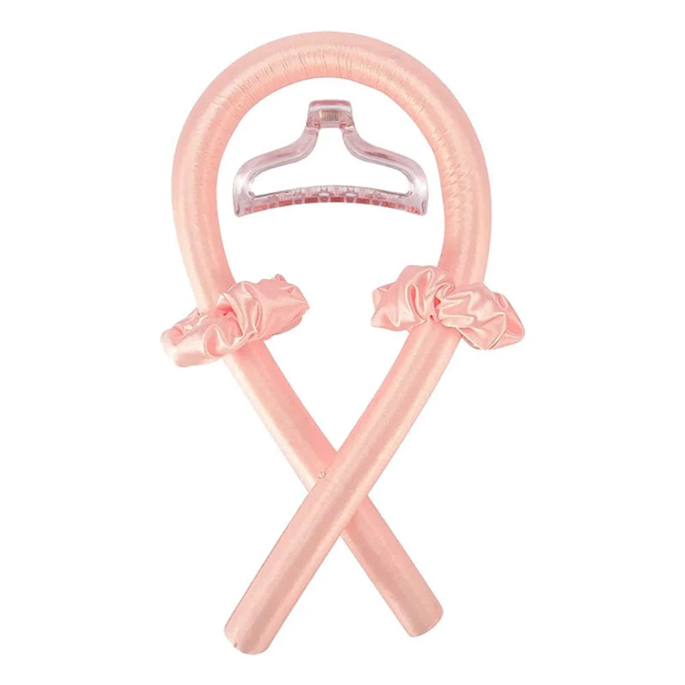 Diadema de seda sin calor rosa con detalle de lazo.