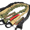 A set of black and olive green quick-release tactical rifle slings with shoulder pads