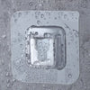 Transparent strong adhesive hooks with a clear plastic backing are shown on a textured surface.
