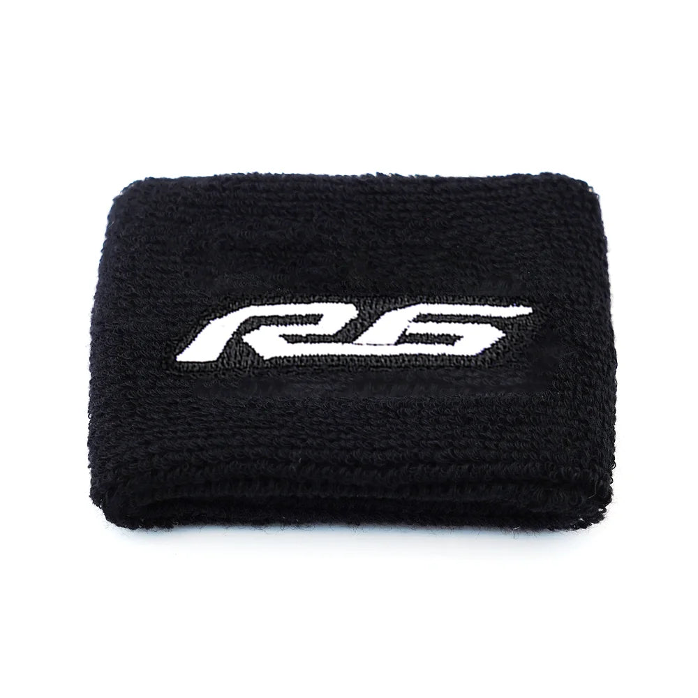 Black microfiber sock with white racing stripes for a brake fluid reservoir cover.