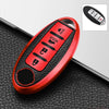 A red TPU key fob cover with multiple buttons is shown on a black textured surface.