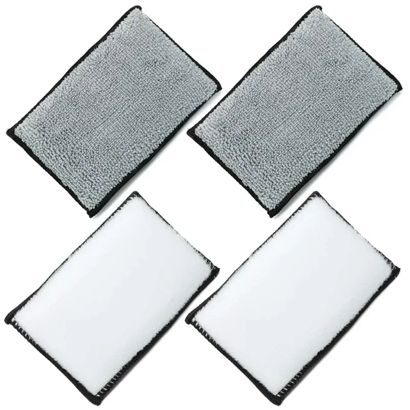 Two square microfiber scrub sponges, one gray and one white, for car detailing.