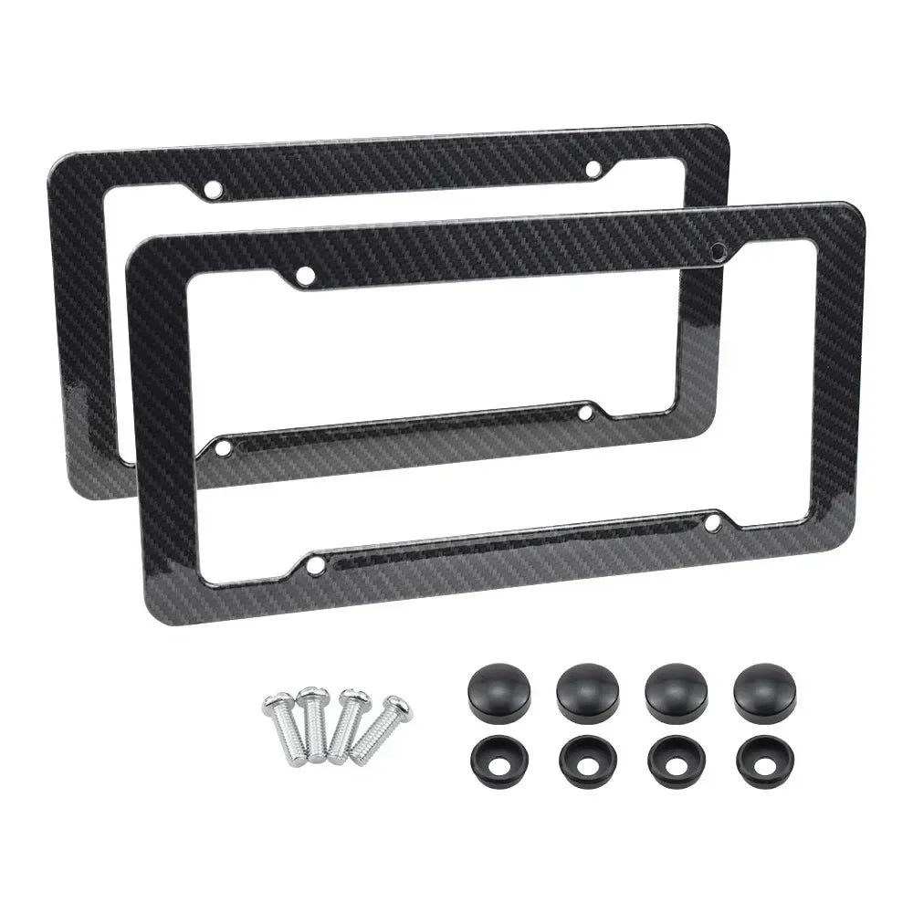 A set of black carbon fiber style license plate frames for front and rear plates, including mounting hardware.