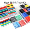 A collection of various colored heat shrink tubing kits, including black, red, yellow, blue, and green tubes.