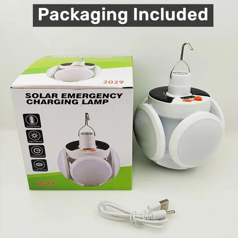A solar emergency charging lamp is shown in its packaging box and as a standalone device.