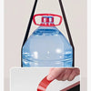A hand is holding a black sliding window seal strip with a red cap and blue liquid inside.