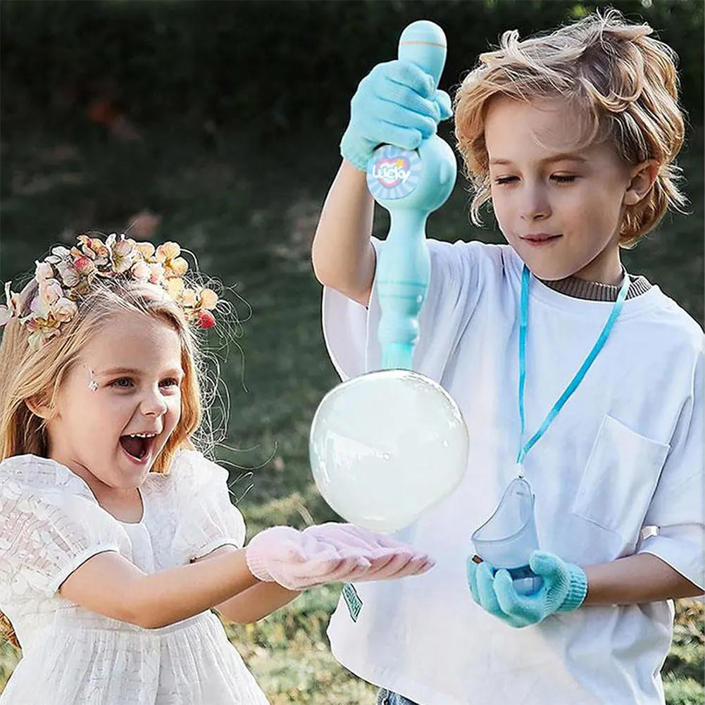 Two children are playing with a magic smoke bubble machine and a large clear bubble.