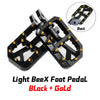 Black and gold Light Bee X foot pedal assembly with mounting hardware shown in detail.