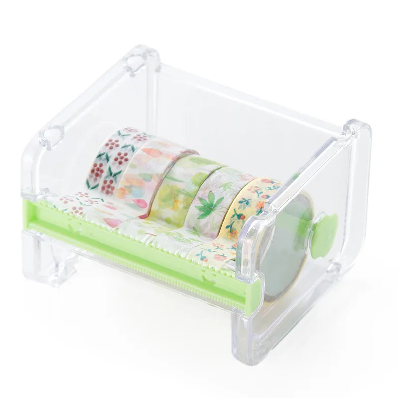 Clear plastic storage box holding rolls of colorful patterned washi tape.