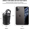 A black coiled device for an ionic detox foot bath is shown next to an iPhone 11.
