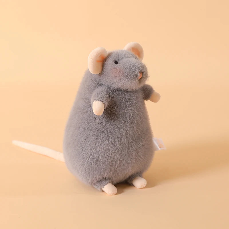 A gray plush mouse stuffed animal with light pink ears and a white keychain loop.