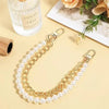 A delicate gold chain necklace featuring multiple strands of white pearls.