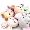 A collection of soft plush baby rattle toys featuring cartoon animal designs like a bear and a rabbit.