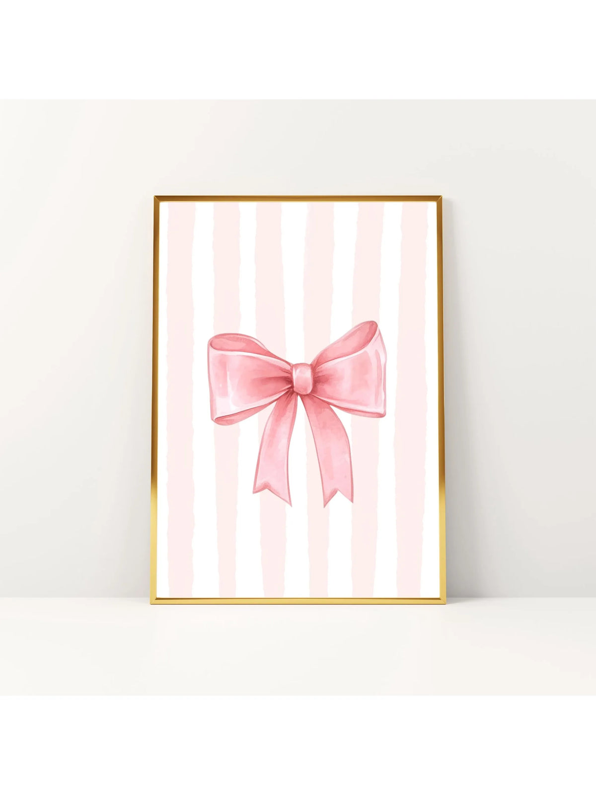Pink bow canvas print featuring vertical pink and white stripes in a gold frame.