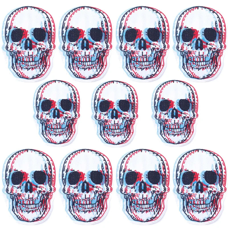 A set of ten embroidered iron-on patches depicting stylized skulls in punk and horror themes.