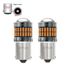 A pair of LED turn signal and reverse light bulbs shown with a single-contact component.
