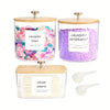 Three clear storage containers for laundry pods and dryer sheets with lids and labels