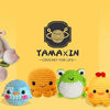 A collection of cute animal amigurumi crochet toys in various colors and textures.