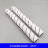 Two white paint brushes with purple stripes are shown diagonally on a gray background.
