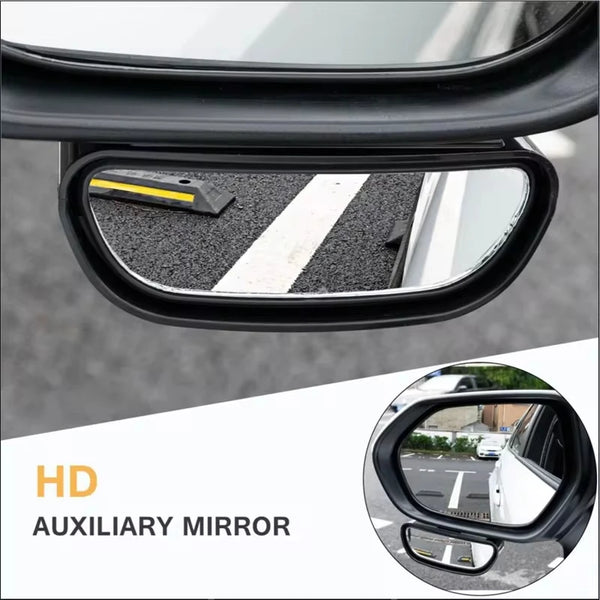 Close-up view of an HD auxiliary mirror mounted on a car door, showing the reflection.