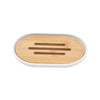 A light wood bamboo bathroom organizer set with three slots for soap dispensers.