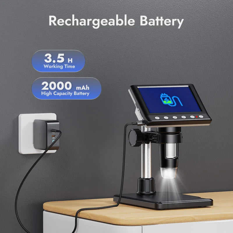 A digital microscope with a rechargeable battery is shown on a wooden surface.