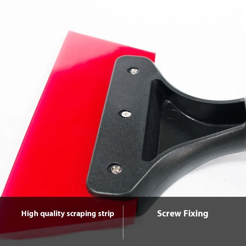A black scraping strip with screw fixing features shown next to a red surface for car wrap installation.