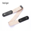 A beige stretch elastic belt with a black buckle shown flat.