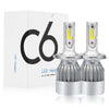 A box and two LED headlight bulbs are shown, featuring a silver housing and yellow light.