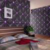 A bedroom wall featuring dark gray wallpaper with a geometric purple star pattern and a wooden headboard.