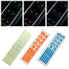 A set of glow-in-the-dark car window button stickers in various colors, including green, orange, and blue.