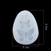 A white epoxy resin mold shaped like a butterfly for DIY jewelry making.