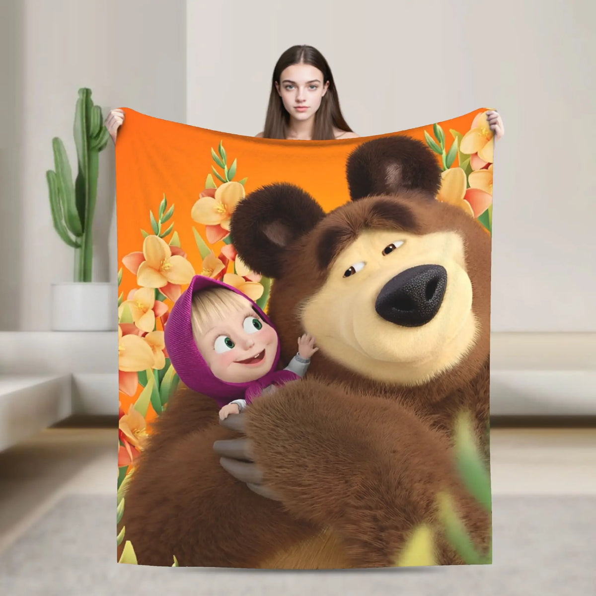 Flannel throw blanket featuring a cartoon design of Masha and Bear.