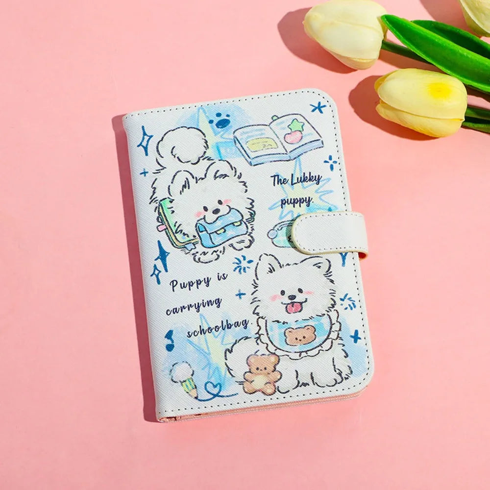 A light blue cartoon puppy design on a white leather passport holder with floral accents.