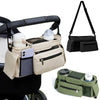 A beige stroller storage organizer bag with multiple pockets and hanging straps is shown next to a green version.