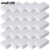 A set of thirty small white melamine sponge cleaning erasers.